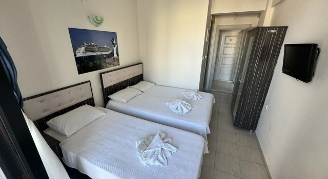 Номер Standard с частичным видом на море Erciyes Otel Kusadasi