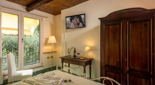Кровать в общем номере Antica Locanda Palmieri