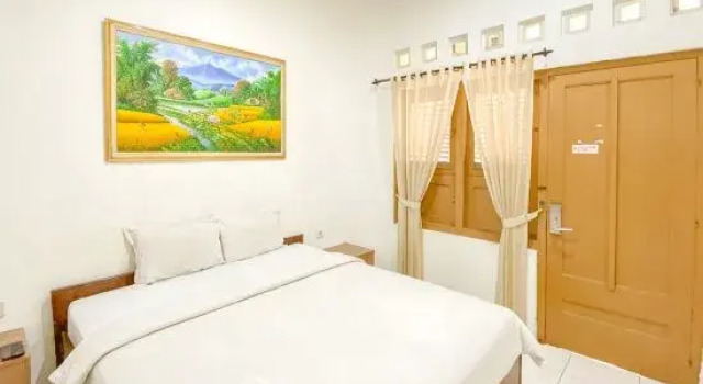 Номер Standard Hotel Maerakaca Tugu Yogyakarta Mitra RedDoorz