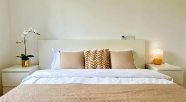 Кровать в общем номере Huasu Homestay (New International Expo Center)