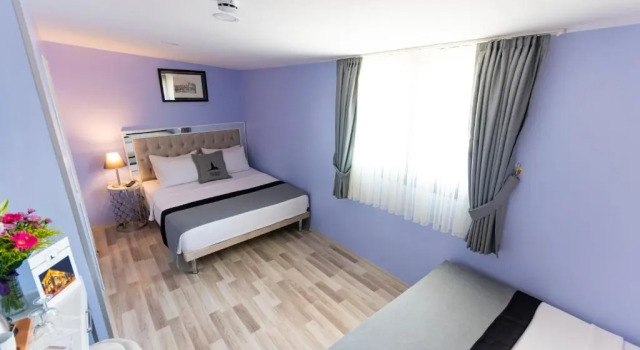 Четырёхместный номер Primero Hotel