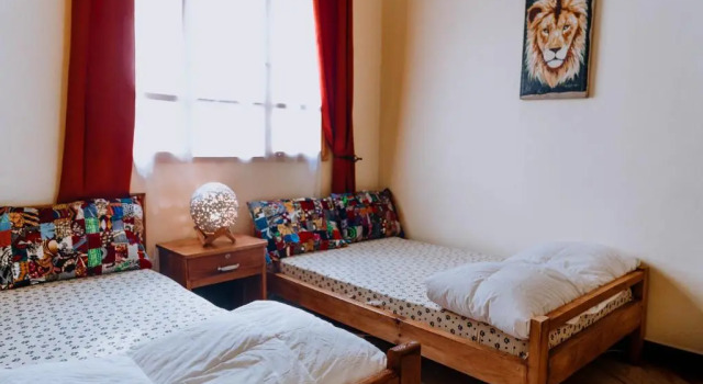 Кровать в общем номере Mkoani Homestay