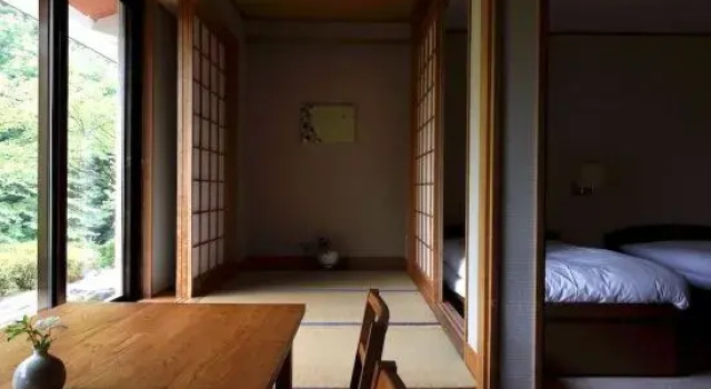 Кровать в общем номере Itamuro Onsen Daikokuya