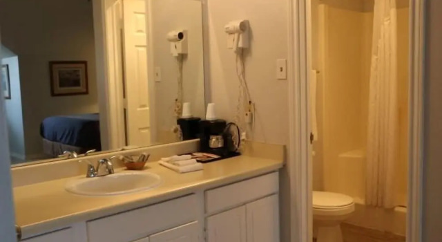 Suite 1 camera da letto Bent Tree Motel