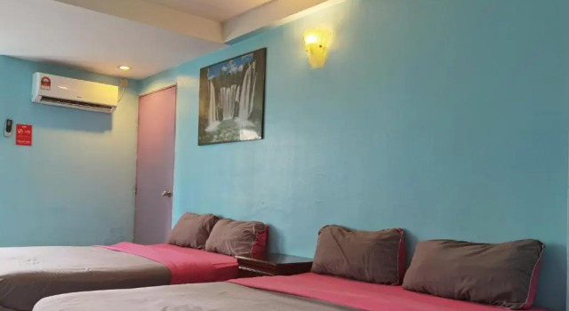 Семейный люкс OYO 252 Lotus Hotel