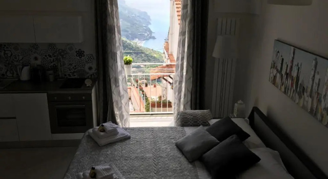 Chez Rosa - Cozy sea view openspace - 10mins from Belmond Caruso Ravello, Забронировать Отель Равелло Побережье Амальфи, рядом с Duomo di Ravello
