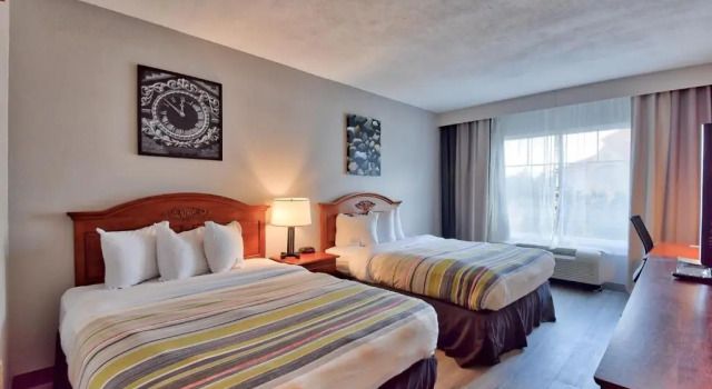 Четырёхместный номер Standard Country Inn & Suites by Radisson, Ocala Southwest