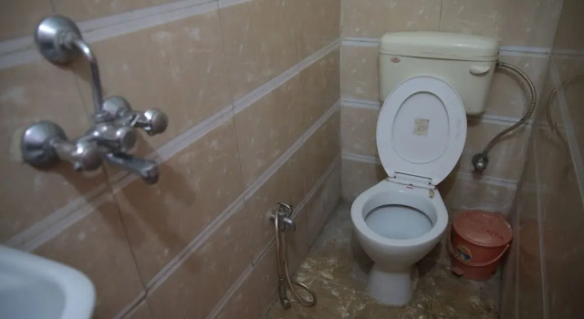Кровать в общем номере с 5 комнатами с балконом Somit Paying Guest House