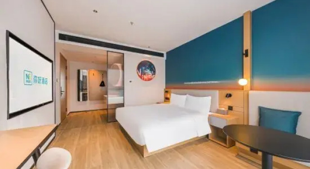 Люкс Ni Hao Hotel (Kaizhou Xinshiji Shopping Plaza)