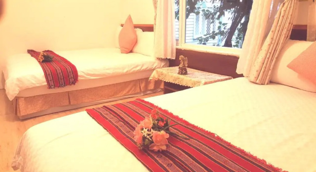 Четырёхместный номер Standard с видом на сад Yishin Garden B&B