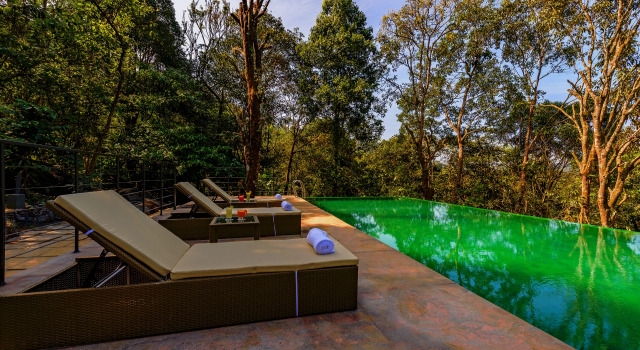 Кровать в общем номере Wayanad Wild - A CGH Earth Experience