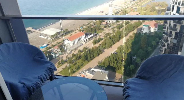 Апартаменты Sea to sky beachfront studio apartment with stunning sea views in Batumi
