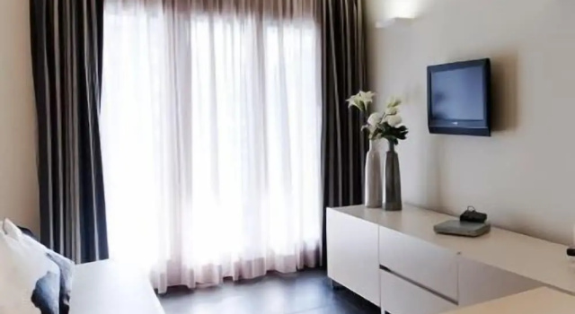 Апартаменты c 1 комнатой с балконом Home Club Suite Hotel