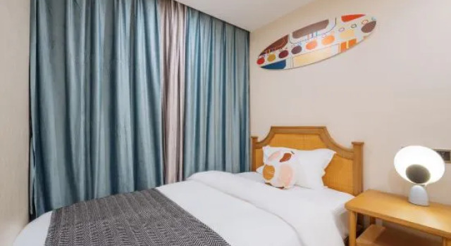 Люкс Deluxe с 2 комнатами с видом на море Yajing Haiju Surfing Seaview Design Hotel (Wanning Sunac Riyuewan Branch)