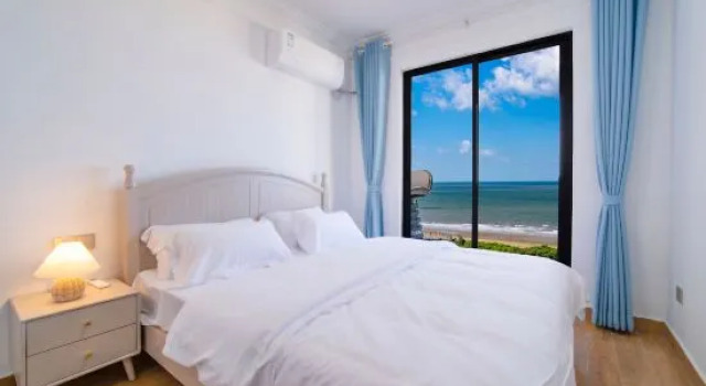 Семейный люкс с красивым видом из окна Nanhai Mingzhu Sea View Resort Homestay
