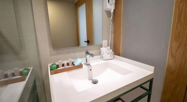 Четырёхместный номер Executive Oliva Plaza Hotel