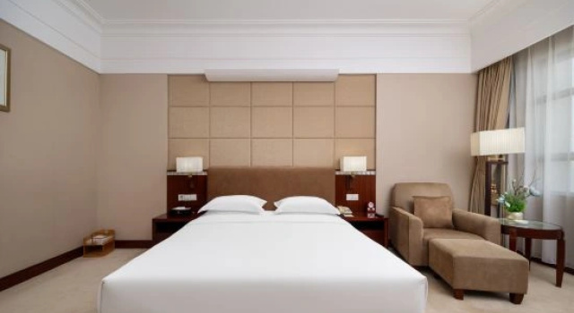 Четырёхместный люкс Executive Exhibition International Hotel