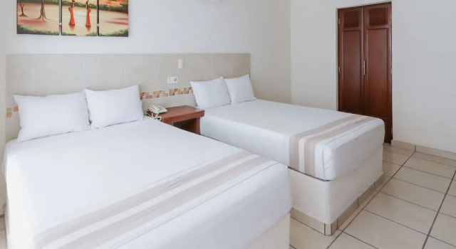 Двухместный семейный номер Standard c 1 комнатой Hotel Guivá Huatulco