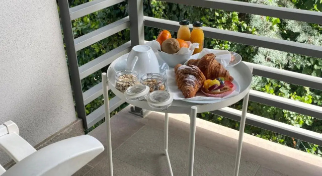 Двухместный номер Standard с балконом B&B WarmUp Grosseto - Parcheggio incluso nella corte interna
