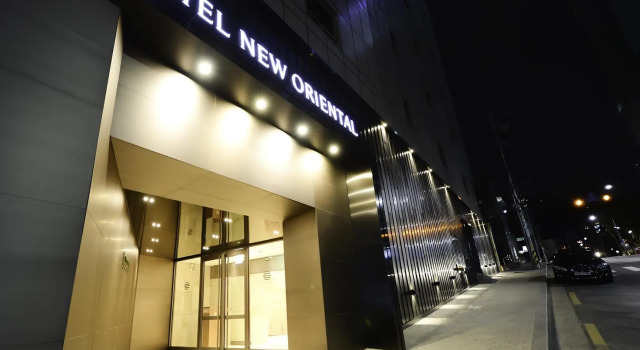 Кровать в общем номере Hotel New Oriental Myeongdong
