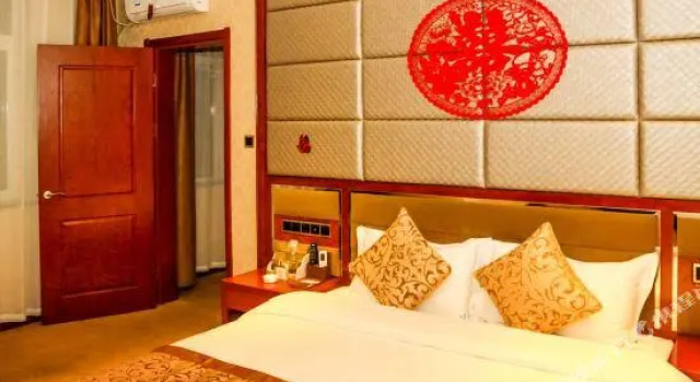 Baotou Di Jing Business Hotel, Rezerwuj Hotel Hotele w Hondlon z parkingiem, Parking