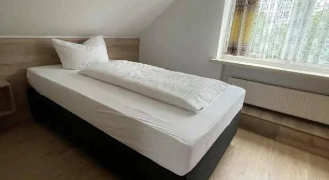 Номер Standard Pension am Meer