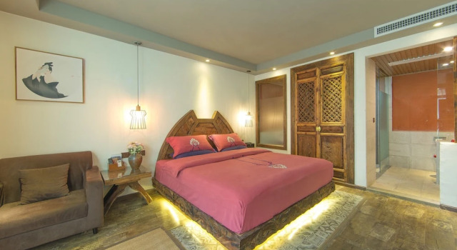 Трёхместный семейный номер Standard c 1 комнатой Old Story Inn Lijiang Old Town