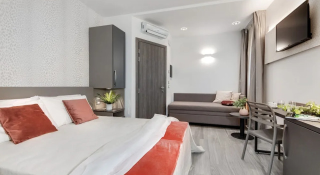 Четырёхместный номер Deluxe Romagna Suite Hotel