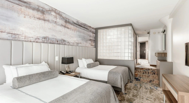 Четырёхместный люкс Deluxe Atheneum Suite Hotel