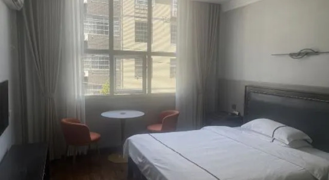 Номер Deluxe Mingdu Business Inn