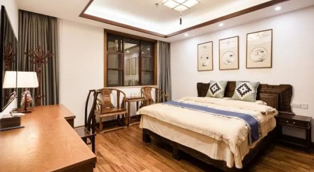 Кровать в общем номере Beiwang Yayuan Guesthouse