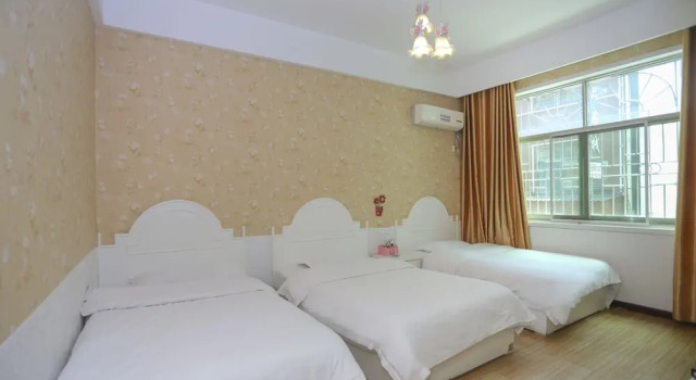 Standardowy trzyosobowy pokój AiShang Hostel