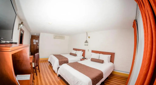 Четырёхместный номер Executive Howard Johnson by Wyndham Morelia Calle Real
