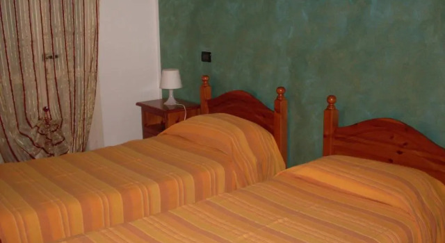 Одноместный номер Standard с балконом и с красивым видом из окна Albergo Quattro Pini