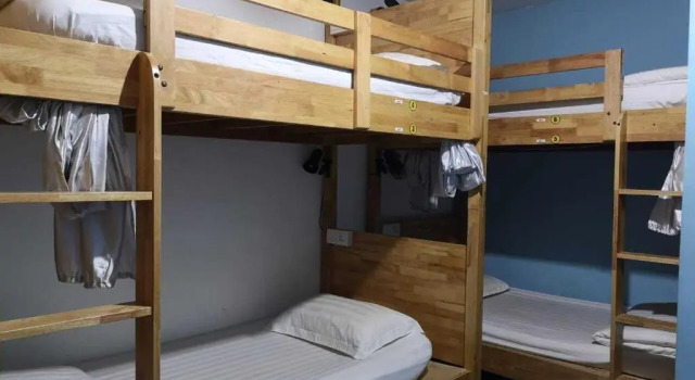 Кровать в общем номере Sim Citystay