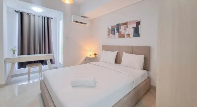 Студия Deluxe Modern Look and Comfortable Studio Barsa City Apartment By Travelio