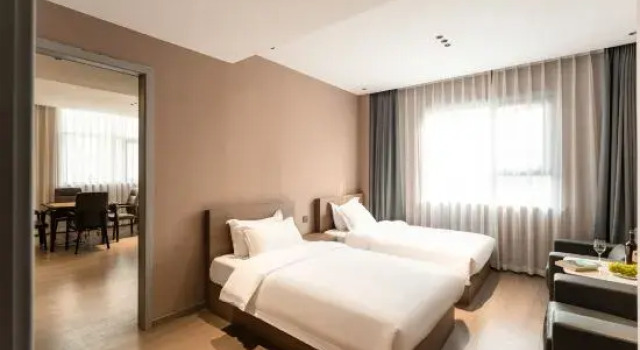 Люкс Deluxe Xuanxi Hotel (Old Town Center Lijingmen Cross Street)