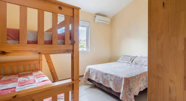 Casa com piscina e ar condicionado em Garopaba