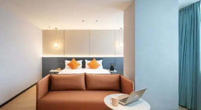 Полулюкс Hangzhou Aisiboge Hotel (Chengbei Vientiane City Hangxing Road Subway Station)