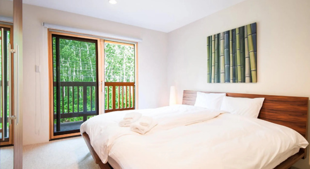 Кровать в общем номере с 6 комнатами Country Resort Niseko