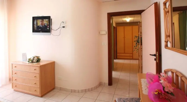 Четырёхместный семейный номер Standard с балконом Aloha Park Hotel