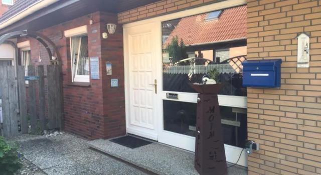 Апартаменты Ferienwohnung " Uns Fischerhuus "