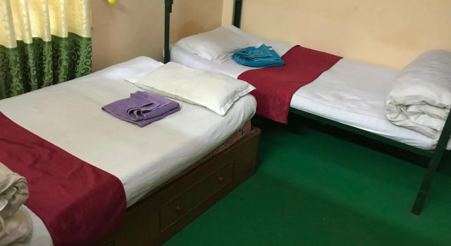 Кровать в общем номере Aroma Tourist Hostel