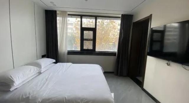 Двухместный люкс Hengyi Hotel (Railway Station Store of Dashu Camp, Renmin East Road, Kunming)