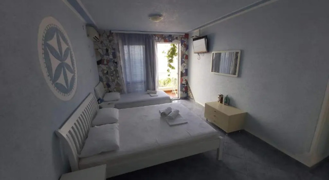 Апартаменты с 2 комнатами с балконом и с видом на море Sun Apartments