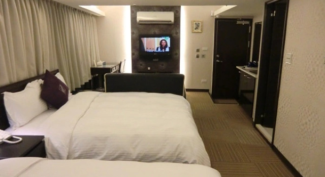 Кровать в общем номере 意芙旅店 Ifinn Hotel