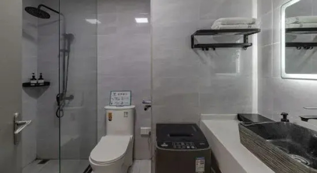 Кровать в общем номере Shaoyang Shuman Jiangjing Hotel