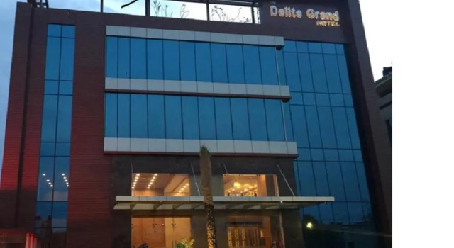 Кровать в общем номере Hotel Delite Grand