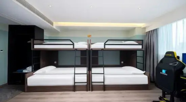 Кровать в общем номере i Electronic Sports Hotel (Zhengzhou Provincial Sports Center Wangzhai Subway Station)