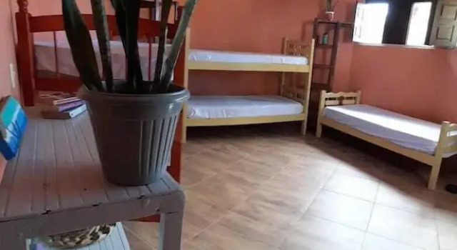 Кровать в общем номере A Arca Pousada